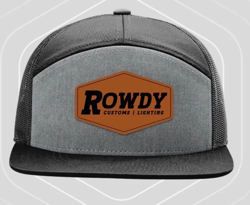 Heather grey seven-panel cap with black mesh side panels, a black brim and a leather Rowdy Customs patch.