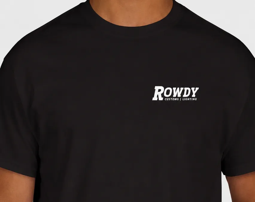 Black t-shirt worn, front view, with a small white Rowdy Customs wordmark on the left chest.